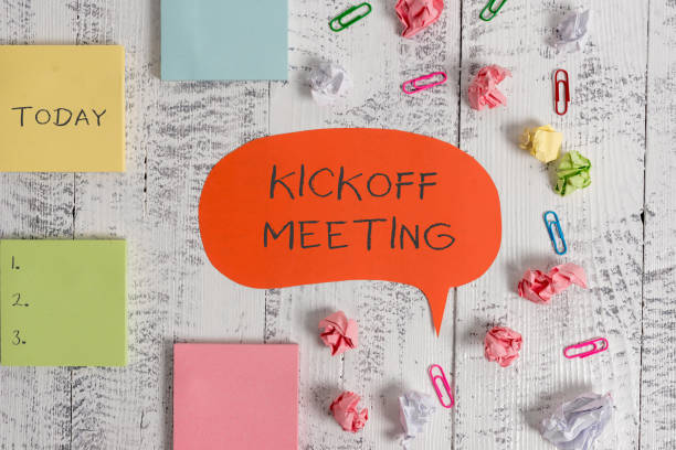 Word writing text Kickoff Meeting Agenda Template. Business photo showcasing Special discussion on the legalities involved in the project Blank speech bubble paper balls clips sticky notes old wooden background