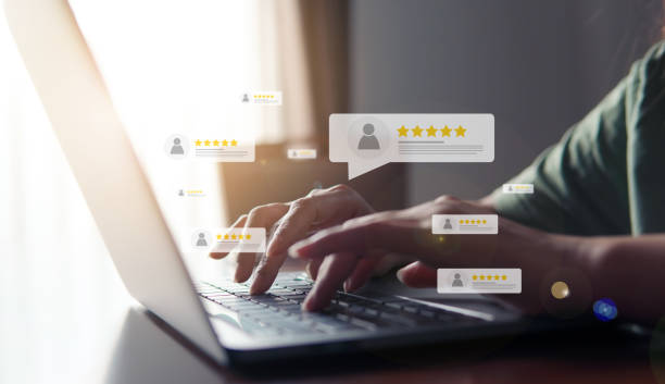 Availability Online: Customer review good rating concept, hand pressing user and five star icon on visual screen for positive customer feedback, testimonial and testimony, user comment and feedback for review.