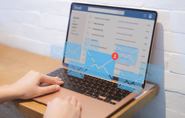 How To Send Recurring Emails in Outlook? Person reading email and new email alert on laptop, communication message to global letters in the workplace, receive new message, online chat social text,