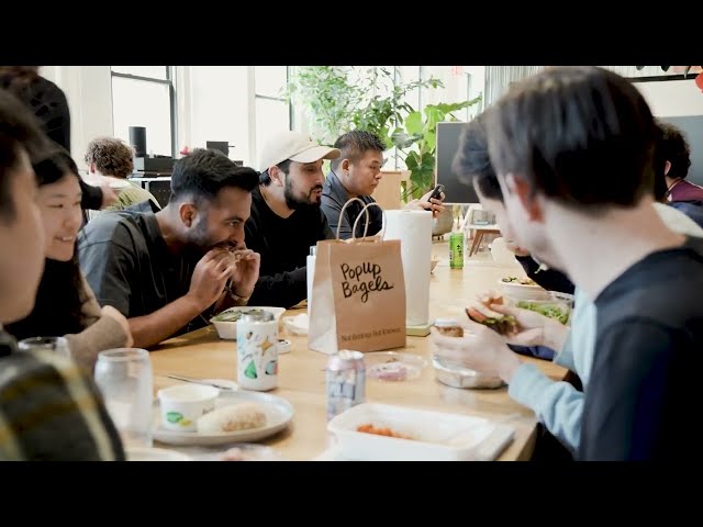 Team member demonstrating AI-powered data analysis for social insights