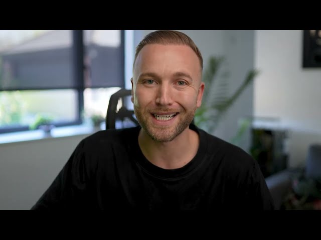 Sales professional standing confidently and gesturing with expressive posture during a cold call