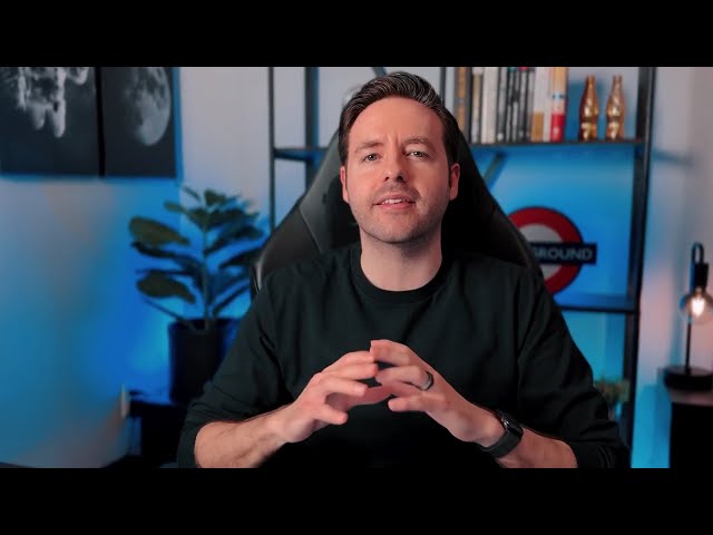 Demonstrating a simple home office recording setup: iPhone on tripod, basic lighting, and a clear outline on a laptop